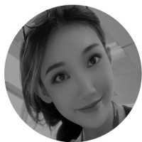 Black and white picture of woman's face smiling