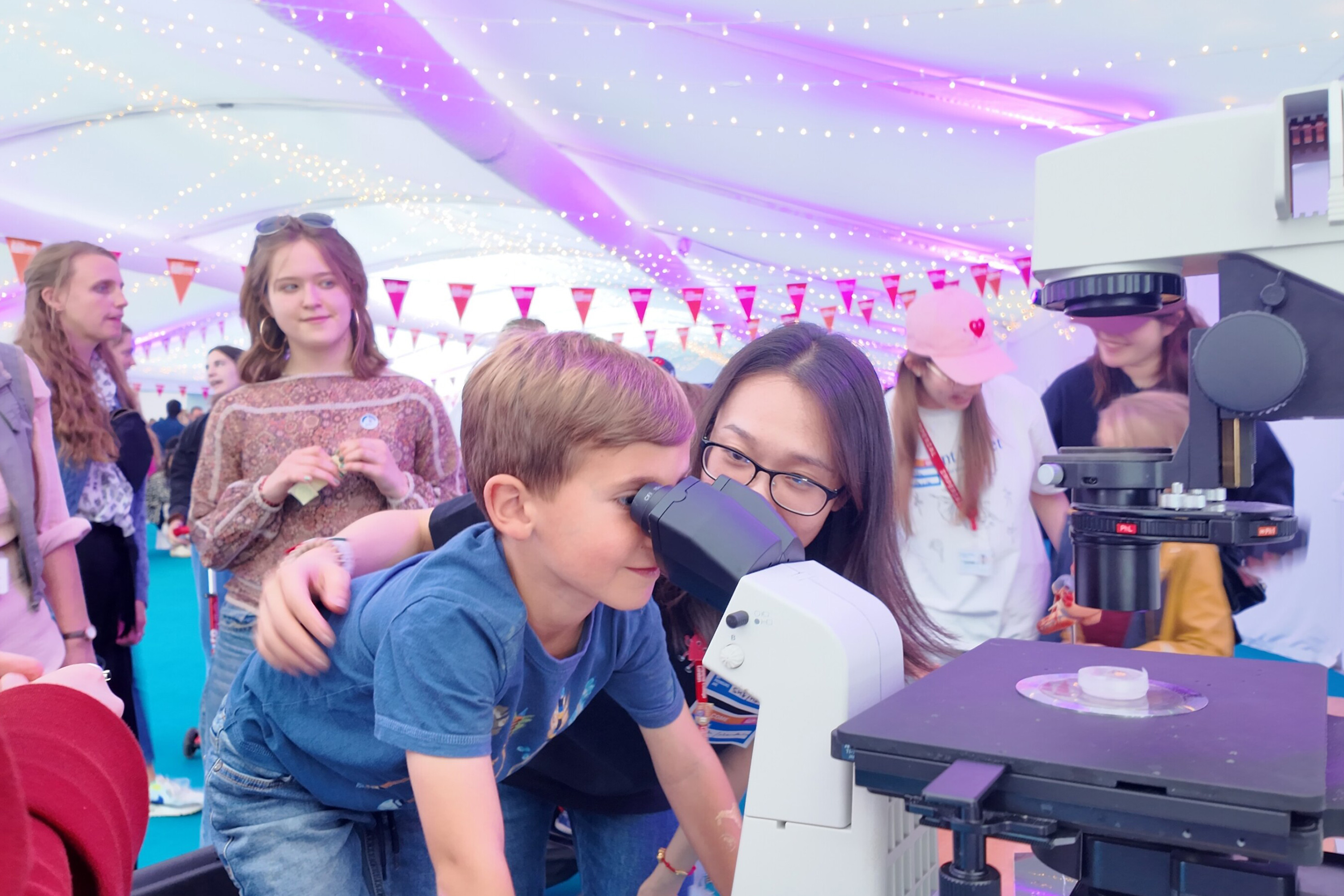 A photo of visitors at the British Heart Foundation CRE Stand at the Great Exhibition Road Festival 2025