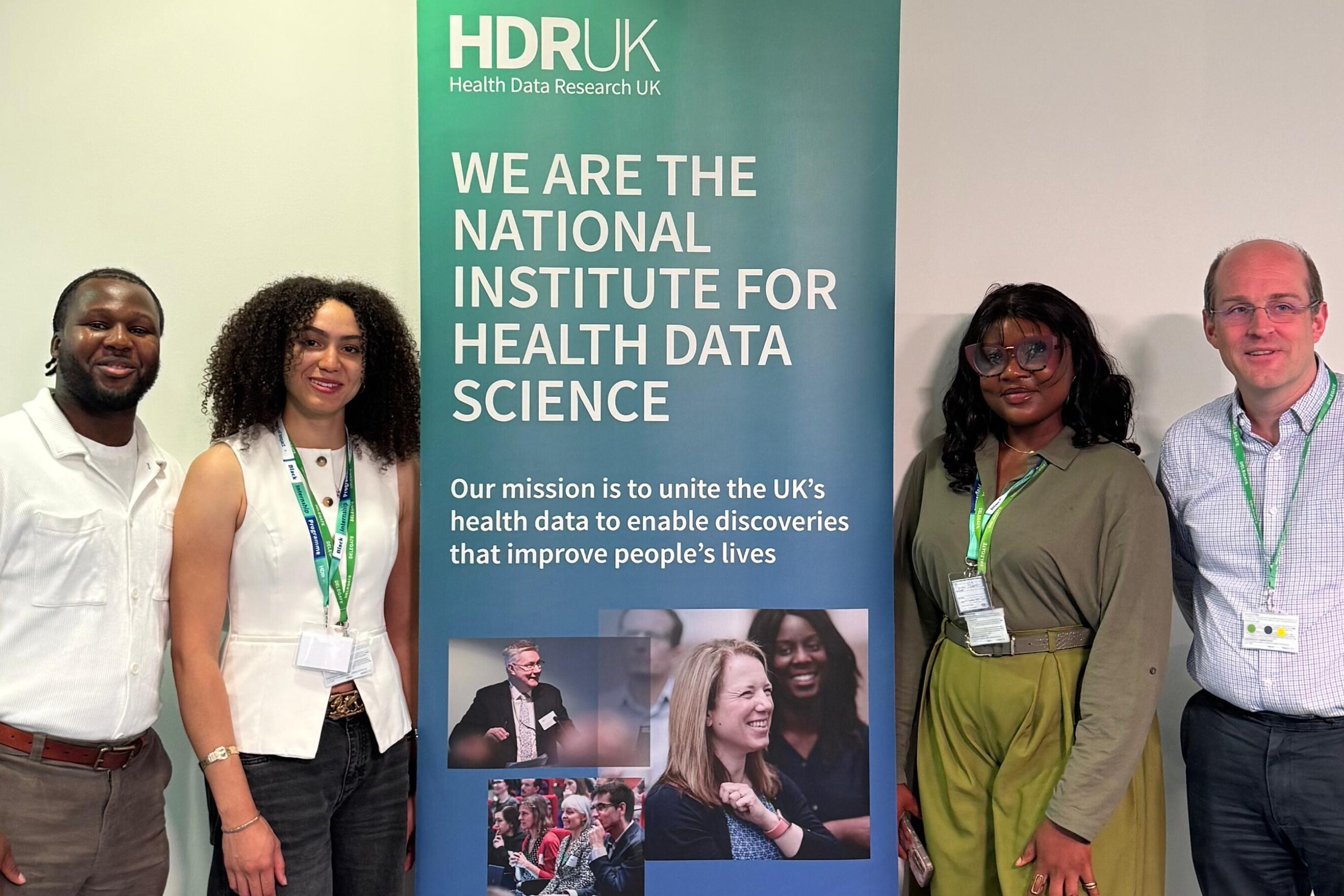 A photo of   Toheeb Sodiq, Tasher Smith, Maryann Nwanaforo and Erik Mayer at HDR UK closing ceremony