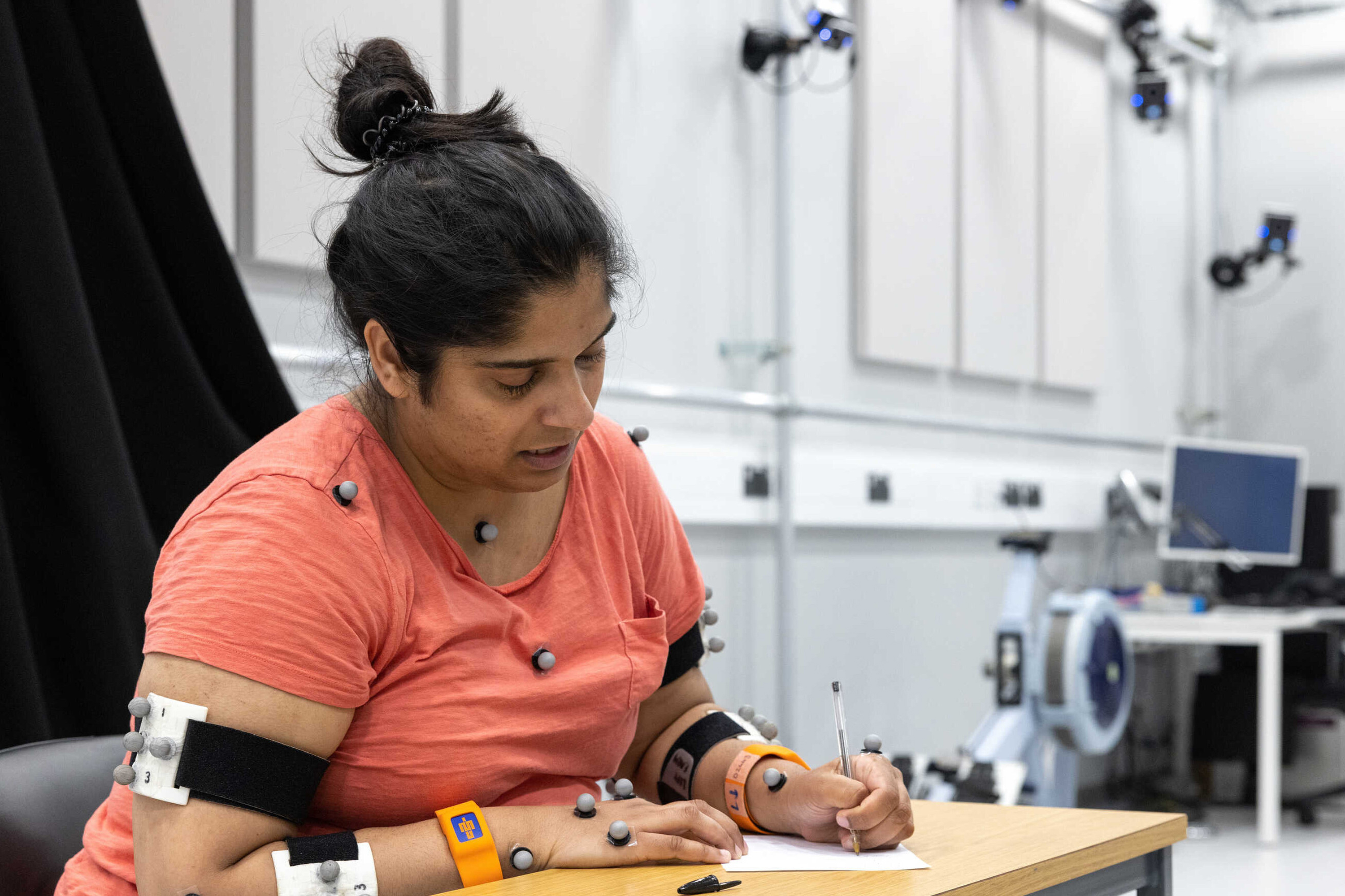 A photo of a woman at a desk
